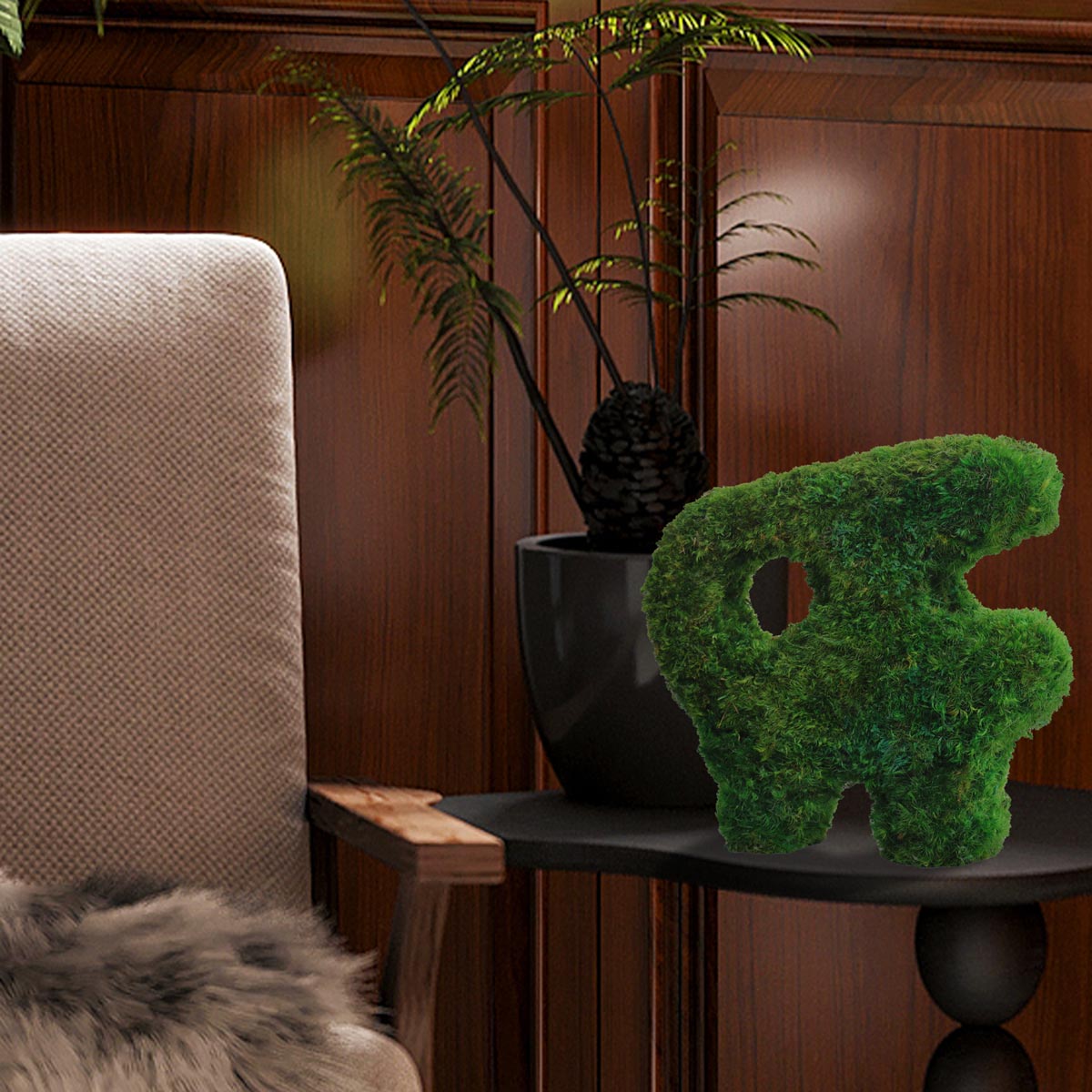 Little Beast Sculptural Mood Moss Tabletop displayed on a modern side table with plants.