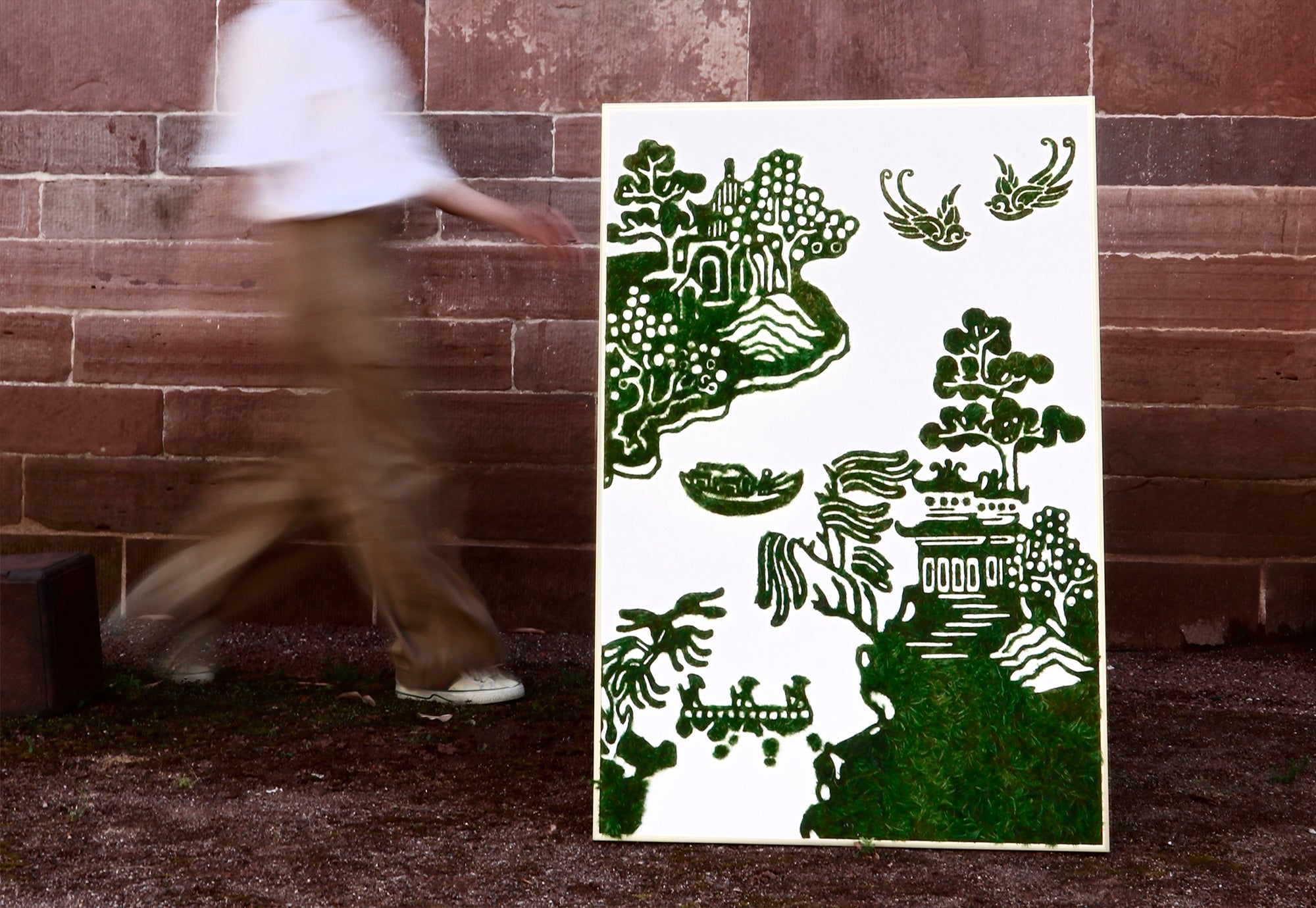 Oriental Moss Wall Art featuring Chinese paper-cut design of West Lake with moss, ancient buildings, boats, birds, and trees, blending nature and culture.