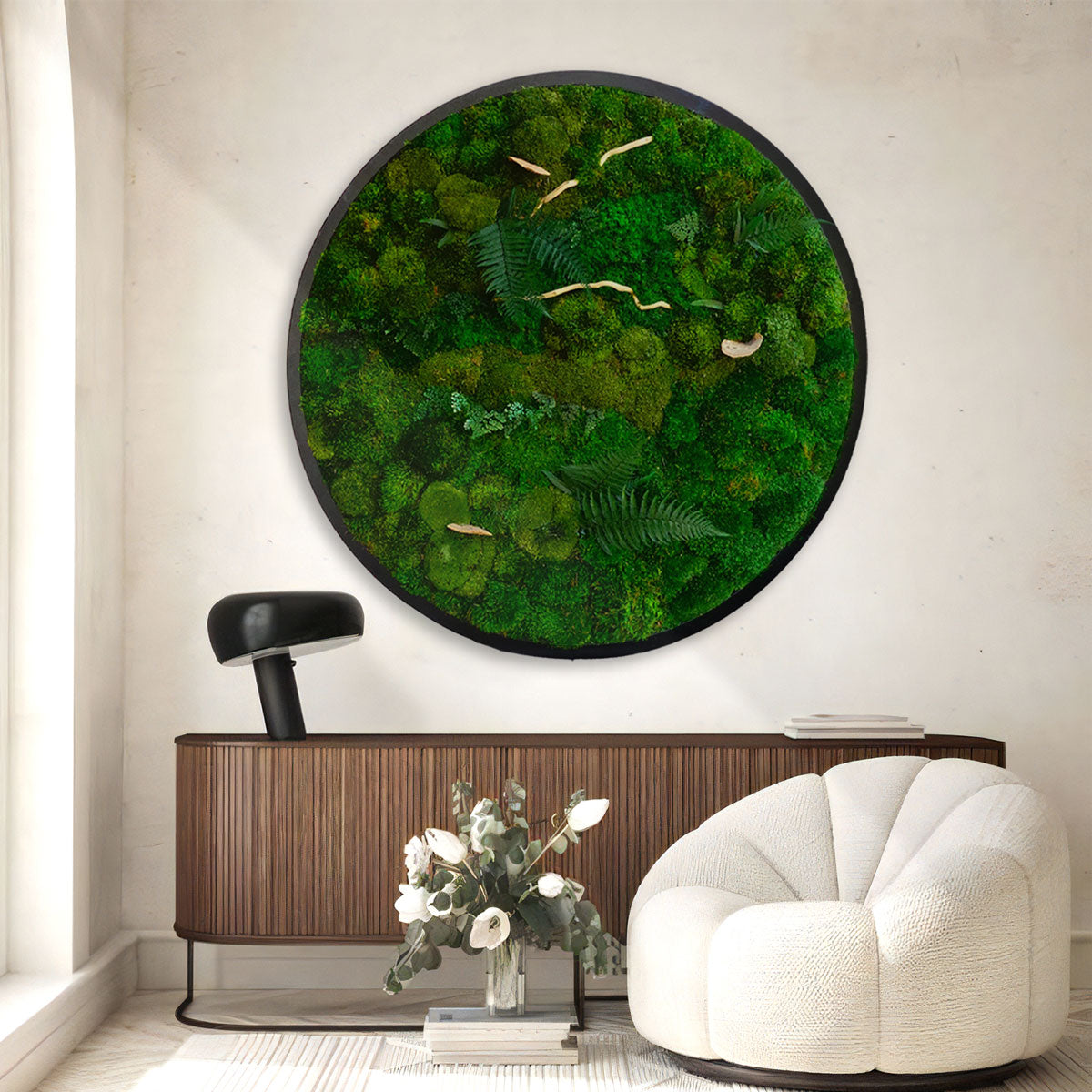 Circular moss wall art as focal point in minimalist office space