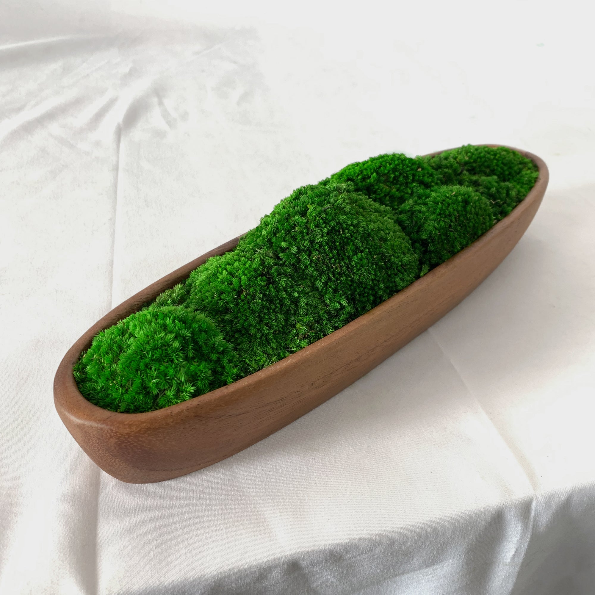 Long Walnut Decorative Moss Bowl centerpiece with preserved bun moss in dark walnut.