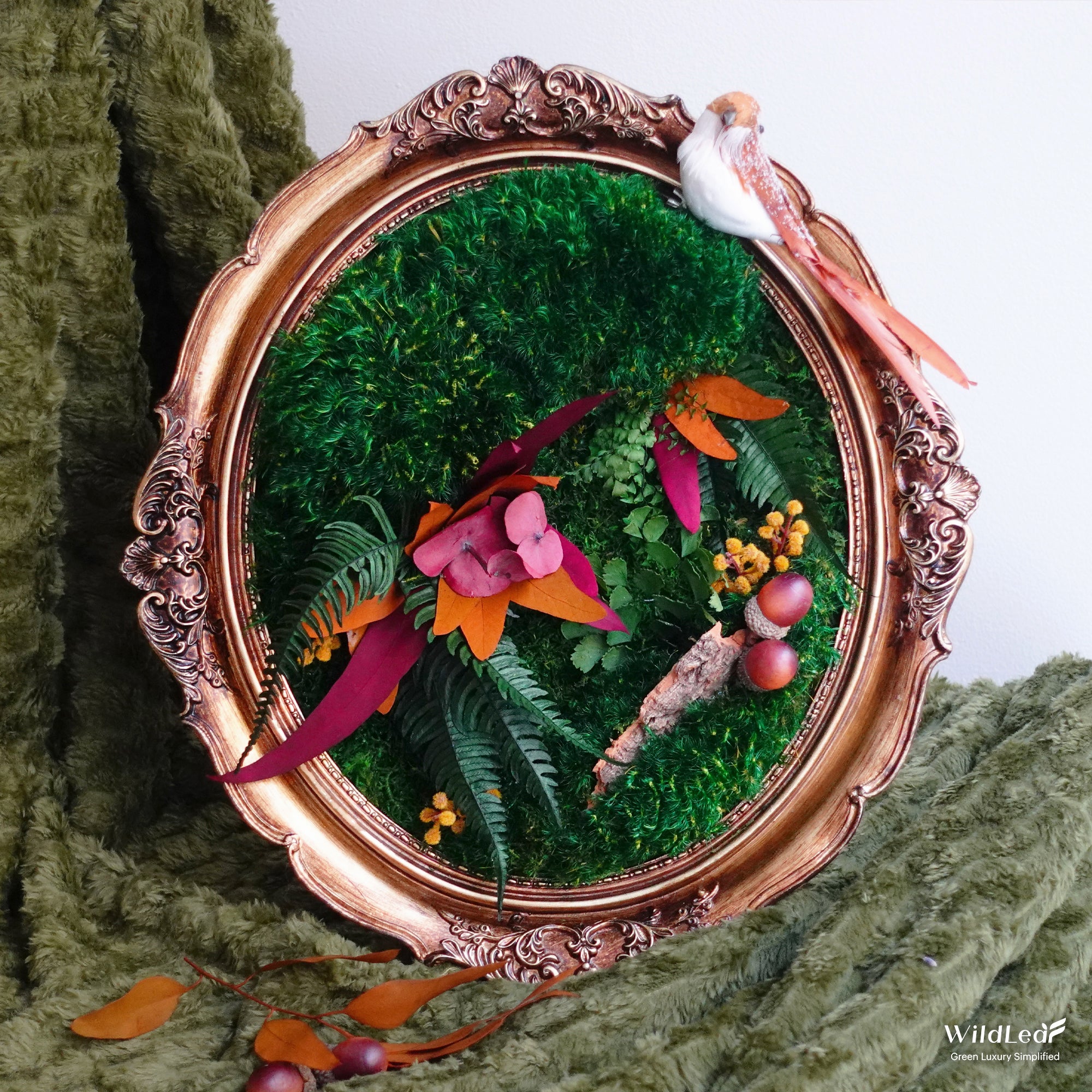 Baroque style Moss Wall Art displayed on a velvet tablecloth, showcasing elegant fall-inspired greenery.