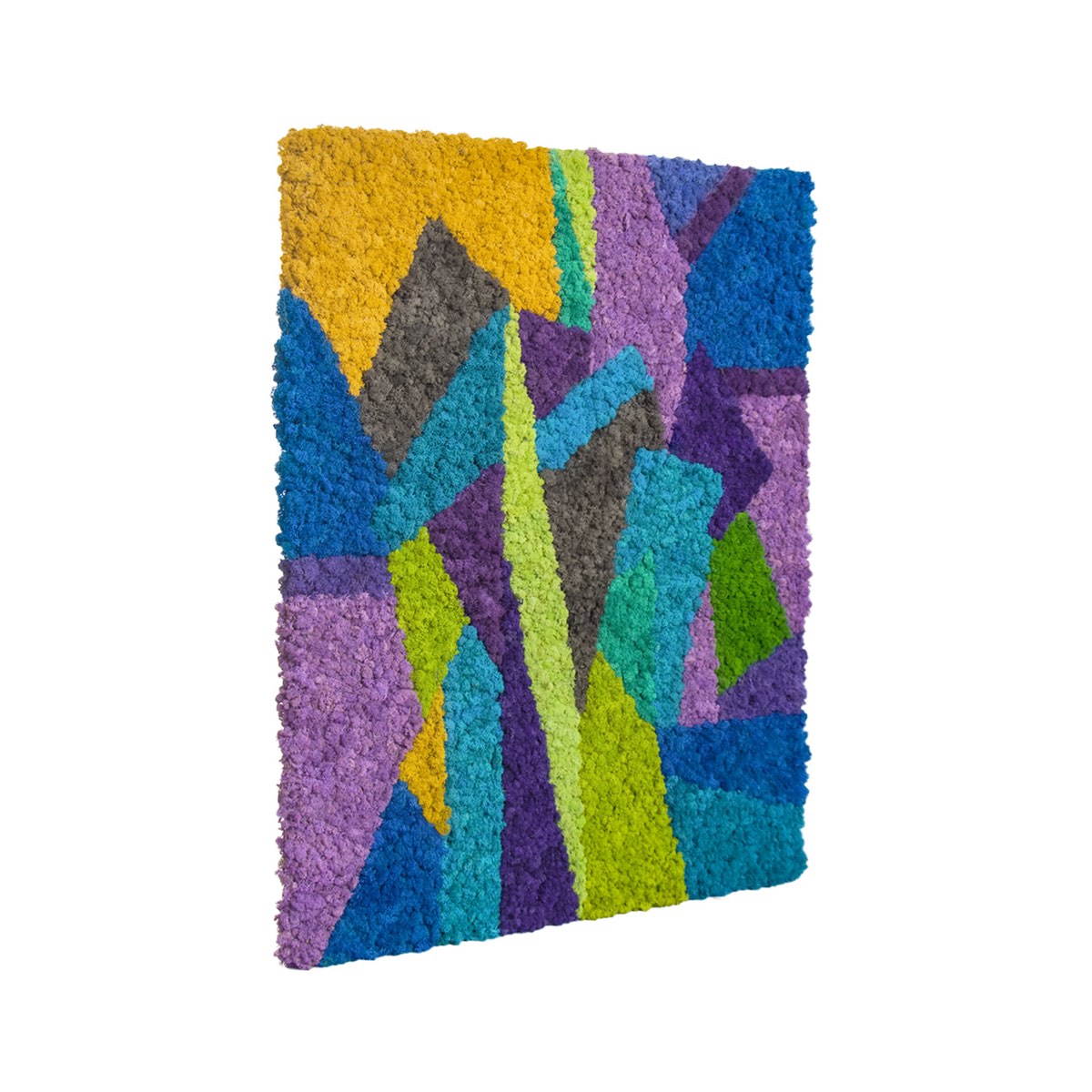 Angled view of abstract reindeer moss wall art in cool tones, highlighting dimensional depth and sculptural moss surface.