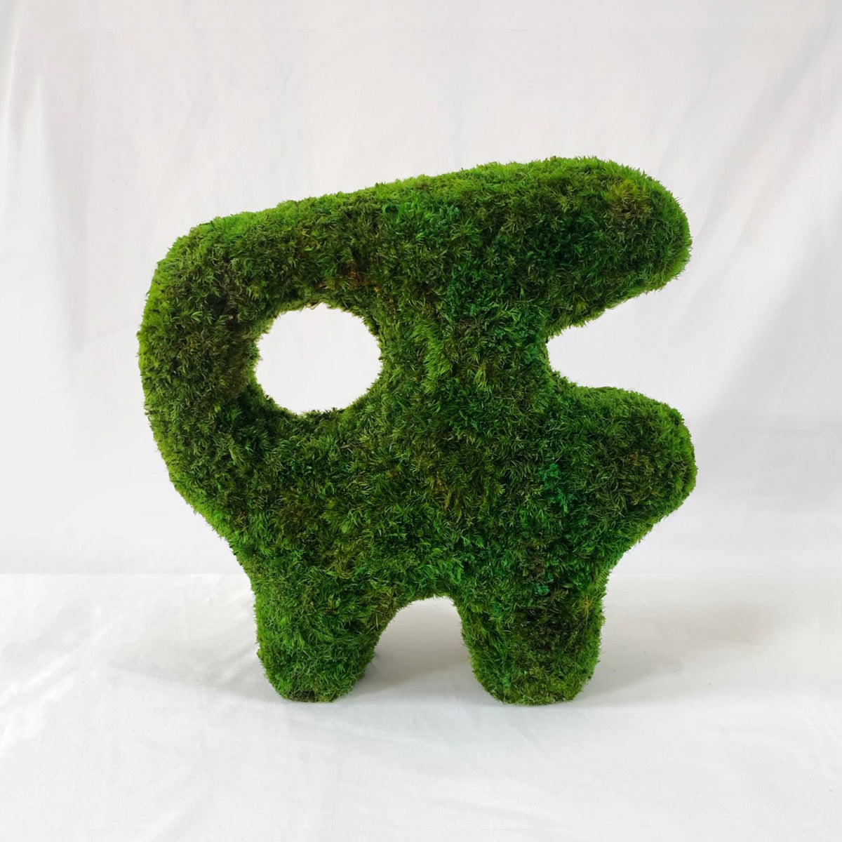 Little Beast sculptural moss tabletop featuring an abstract creature-like form made from preserved green moss