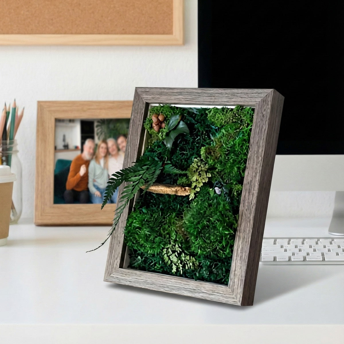 Lush Moss Table Frame in Walnut displayed on a clean office desk, featuring preserved moss and foliage for natural workspace decor.