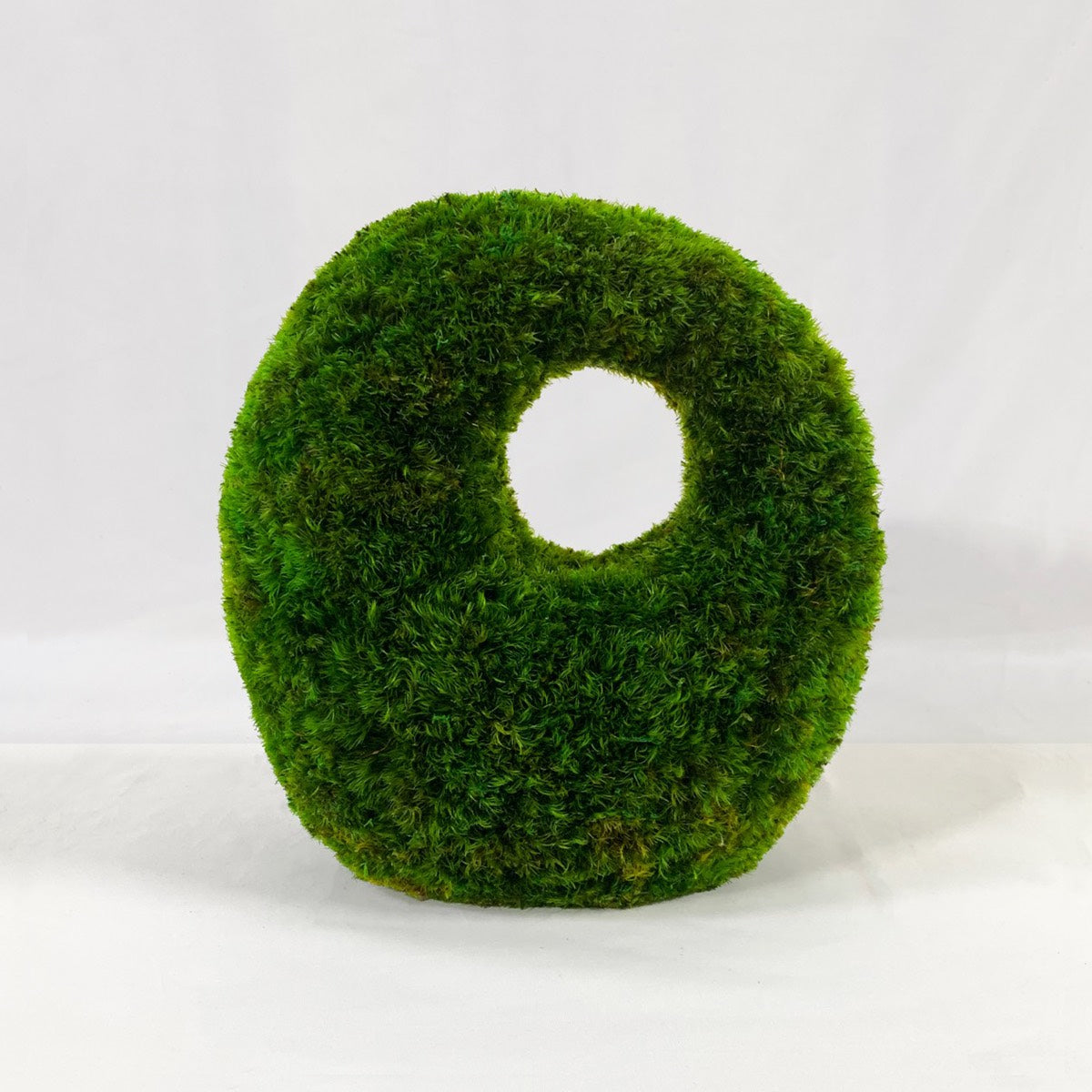 Pebble Alcove sculptural tabletop object made with preserved moss in a rounded organic form
